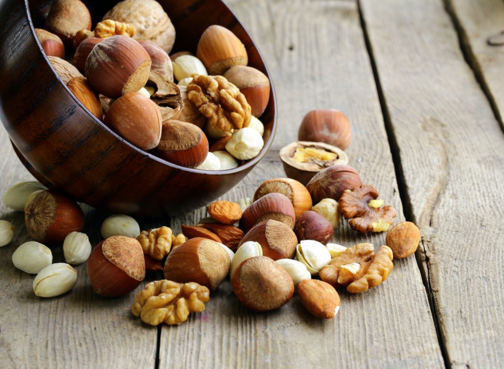 Mix nuts (almonds, hazelnuts, walnuts) on a wooden table Federación